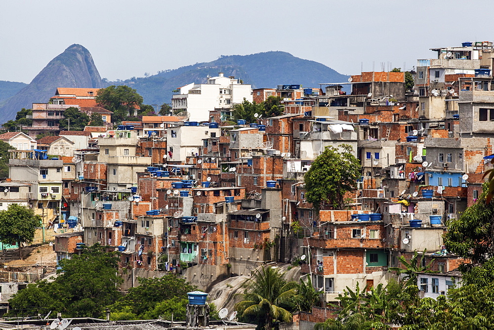 The View From Santa Teresa Looking Towards Sugarloaf Mountain With A Favela In The Foreground, Rio De Janeiro, Brazil