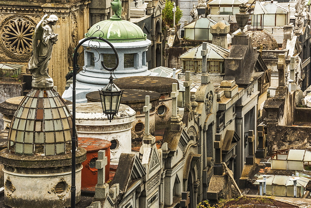 Statue Of Angel Looking Over Recoleta Cemetery, Buenos Aires, Argentina