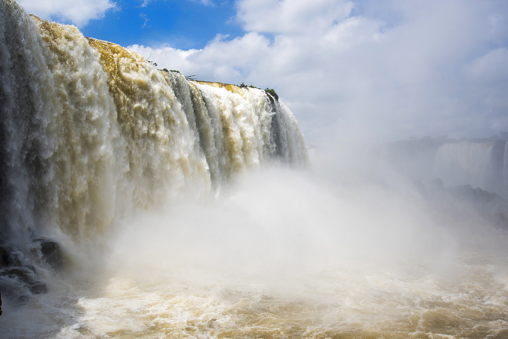 Cloud Of Spray Beneath Sunny Iguazu Falls, Parana, Brazil