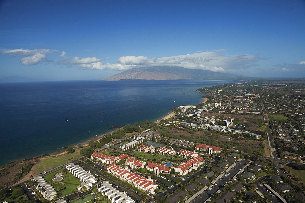 Aerial View Of Condominiums, Kihei And Wailea, A Sailboat And The West Maui Mountains, Kihei, Maui, Hawaii, United States Of America