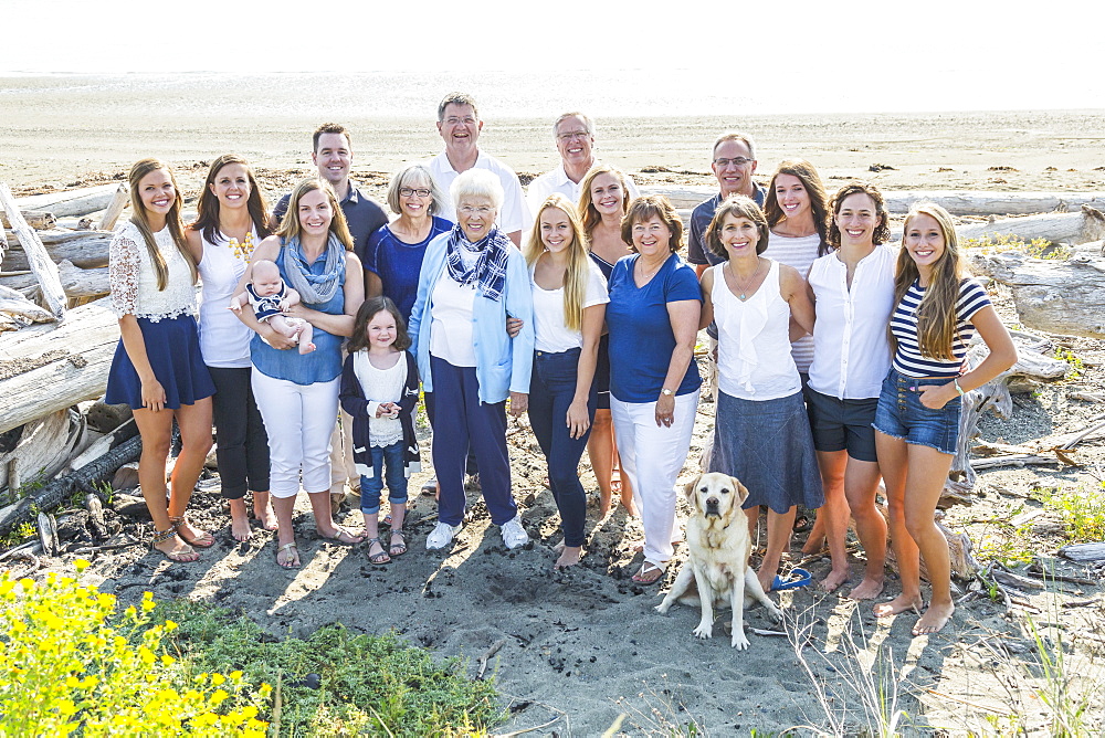 Portrait Of A Large Family On A Beach Along The Coast, Fox Spit, Whidbey Island, Washington, United States Of America