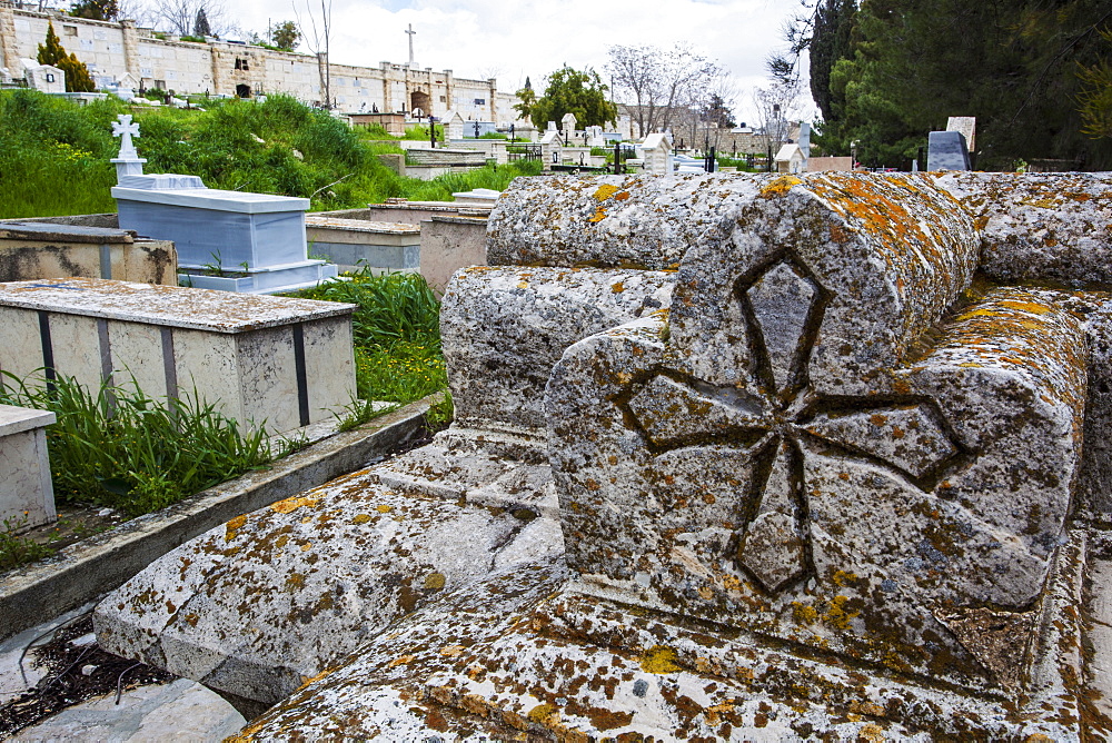 Old Tombstones In A Cemetery With A Carved Cross, Israel