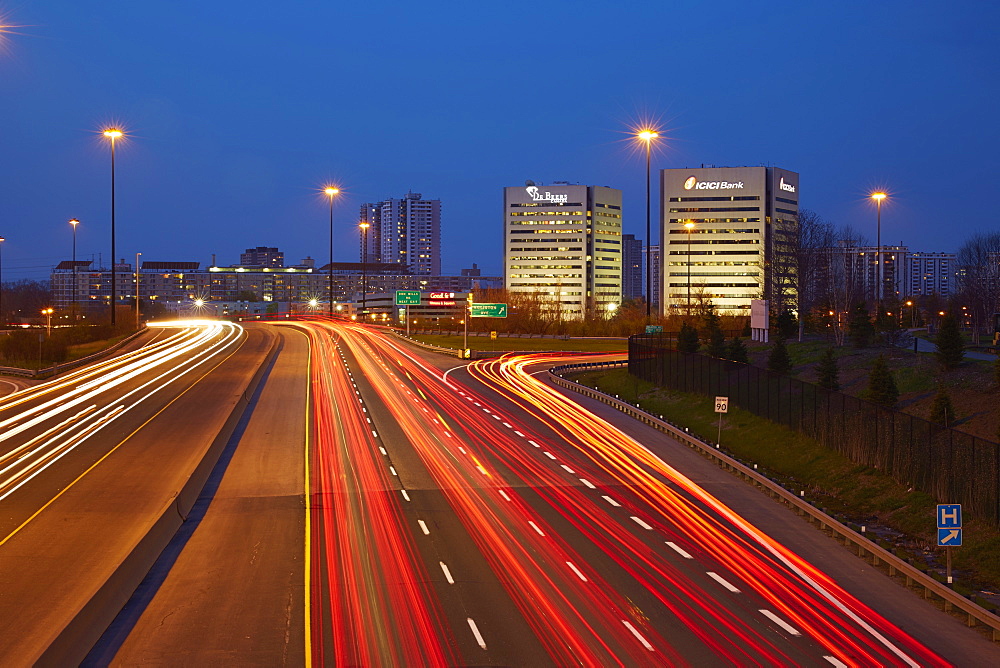 Early Morning Traffic On The Don Valley Parkway, Looking South At The Debeers Canada And Icici Bank Offices, Toronto, Ontario, Canada