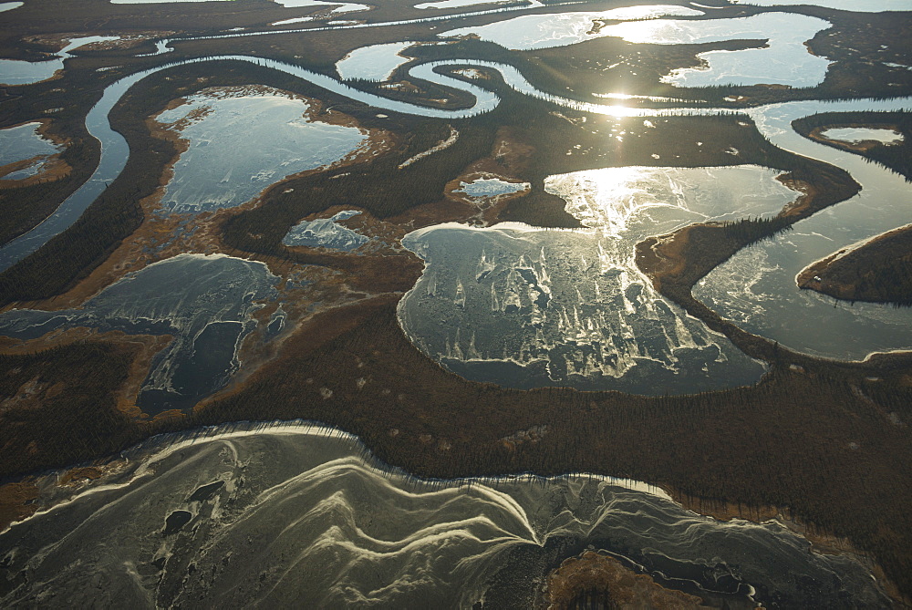 Aerial Of Frozen Ponds That Surround The Meandering Noatak River Near Kotzebue, Arctic Alaska