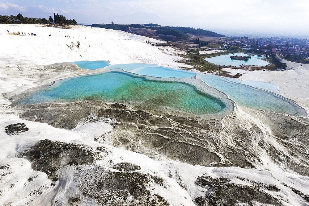 Hot Springs And Travertines, Terraces Of Carbonate Minerals Left By The Flowing Water, Pamukkale, Turkey