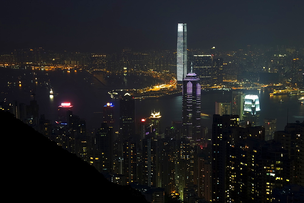 Victoria Harbour Docks Lit Up At Night, Hong Kong, China