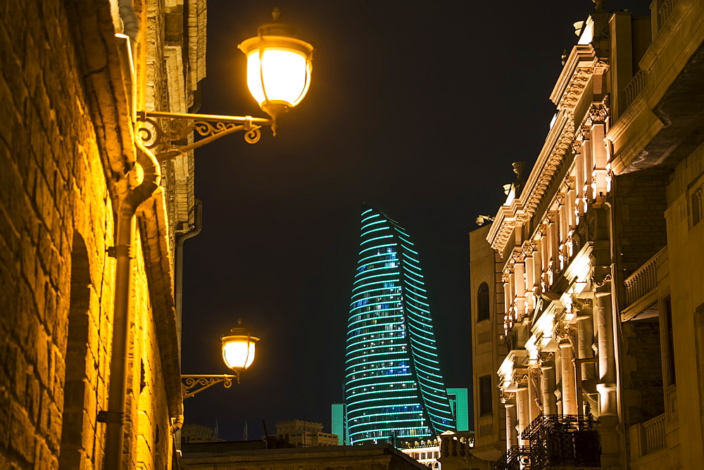 Mansions On Boyuk Qala Street With The Flame Towers In The Background At Night, Baku, Azerbaijan