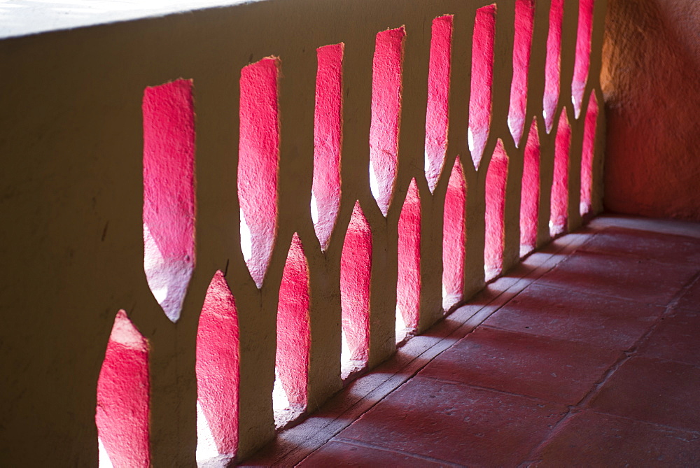 Light And Shadow Through A Mexican Pink Painted Stucco Wall, Ixtapa, Mexico