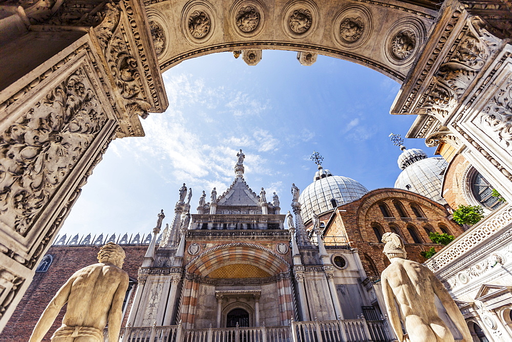 Low Angle View Looking Out Towards The Chapel And St Mark's Basilica Through The Courtyard Of Doge's Palace, Palazzo Dulce, Venice, Italy