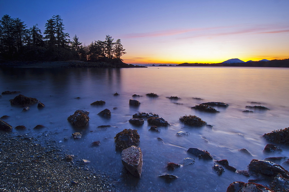 Colors Of Dusk And Incoming Surf At Halibut Point Recreation Area With View Of Magic Island, Sitka, Alaska, United States Of America