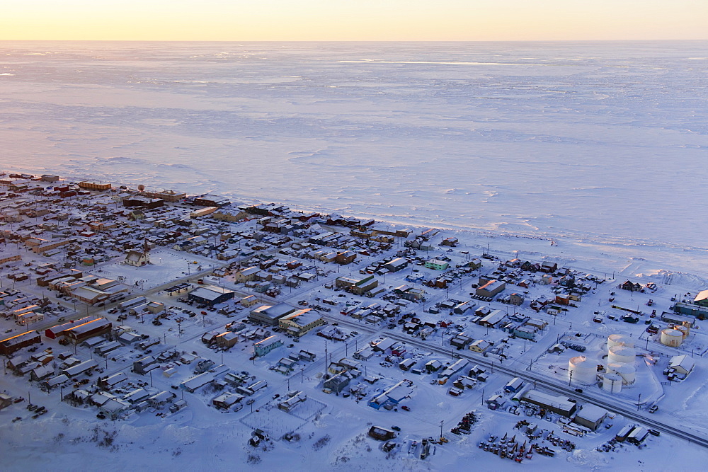 Aerial Sunrise View Of The Village Of Nome On The Seward Peninsula And The Frozen Bering Sea, Nome, Alaska, United States Of America