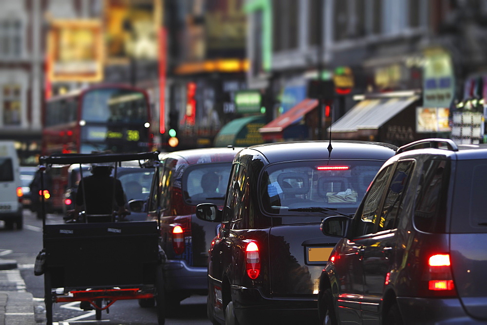 Taxis And Traffic On Shaftsbury Avenue, London, England