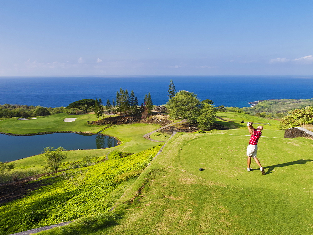 Golfer On Golf Course At Kona Country Club, Kailua Kona, Island Of Hawaii, Hawaii, United States Of America