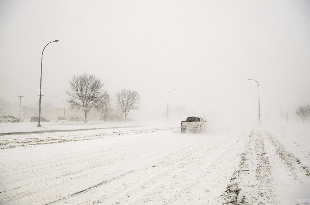 A Truck Driving Through A Blizzard, Grand Forks, North Dakota, United States Of America