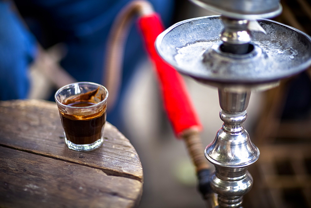 A Glass Of Turkish Coffee Sits By A Sheesha In A Small Village Near Luxor, Egypt