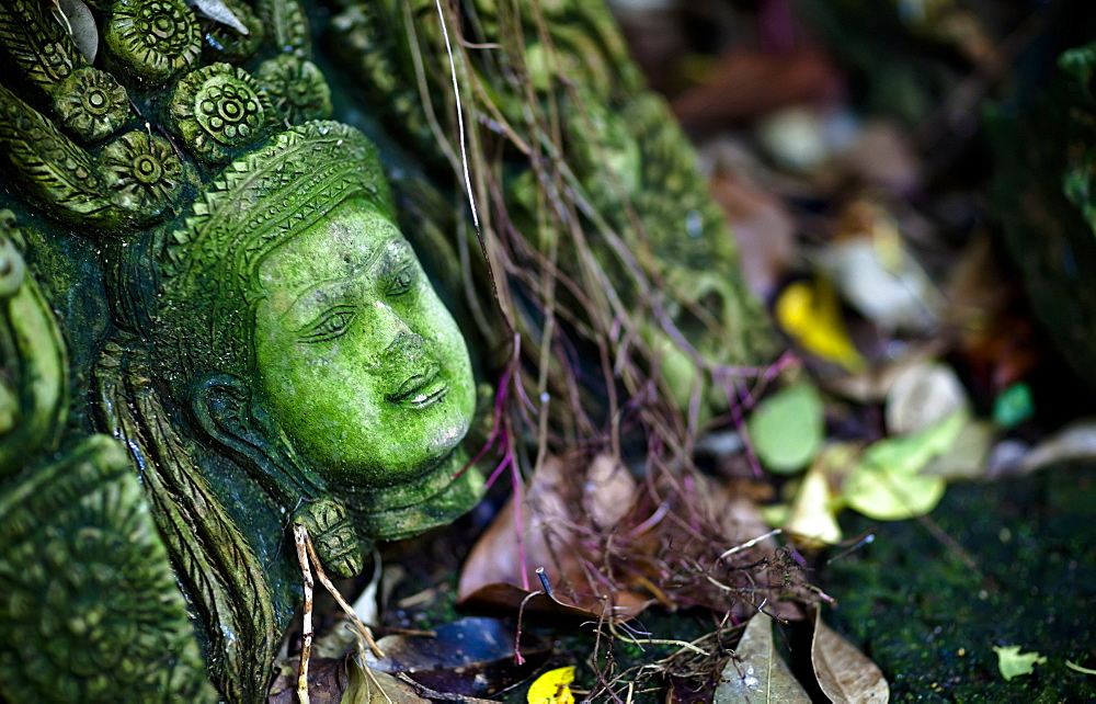 Terra-Cotta Sculpture Of A Thai God Or Perhaps A Temple Attendant Lies In Ruin, Chiang Mai, Thailand