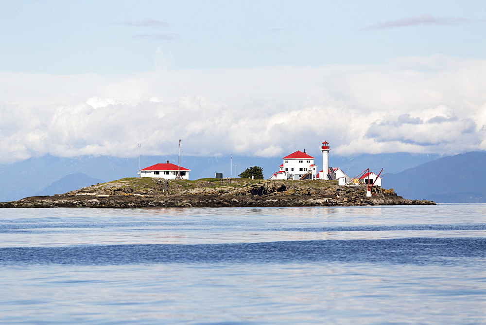 A manned lighthouse station on Entrance Island, near Nanaimo in the Georgia Straight, guides ferry traffic towards the harbour, Nanaimo, British Columbia, Canada