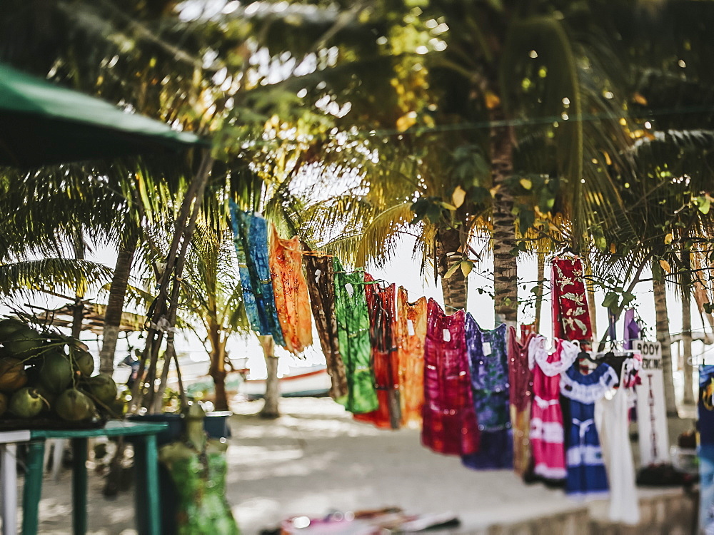 Clothing hanging on display for sale at an outdoor market, Cancun, Mexico