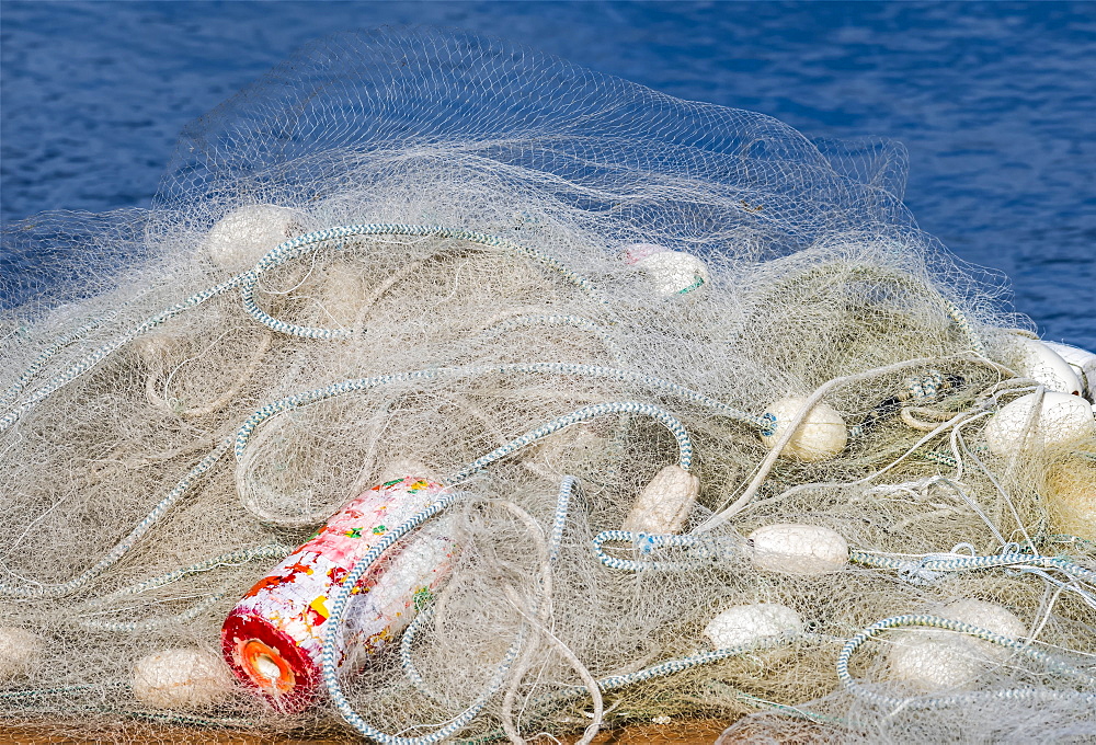 A Fishing Net Is Piled On A Dock, Astoria, Oregon, United States Of America