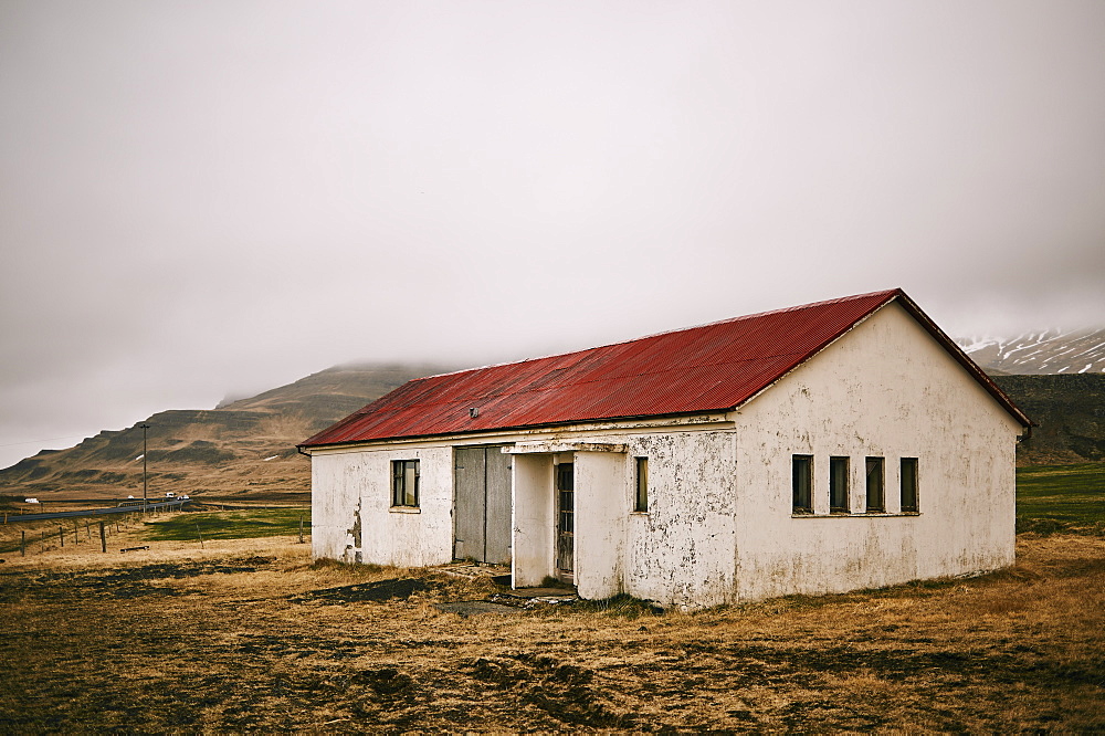 Weathered Building Under Clouds On The Snaefellsnes Peninsula, Iceland