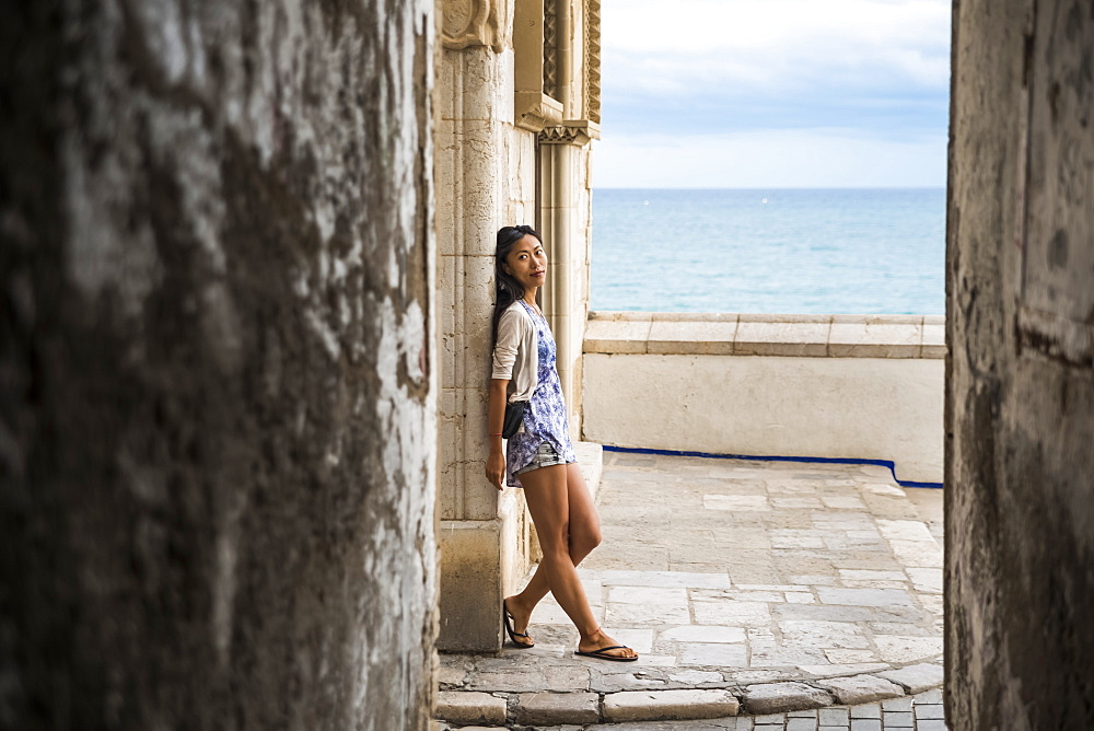 Portrait Of A Chinese Young Woman In Maricel Palace, Sitges, Barcelona Province, Spain