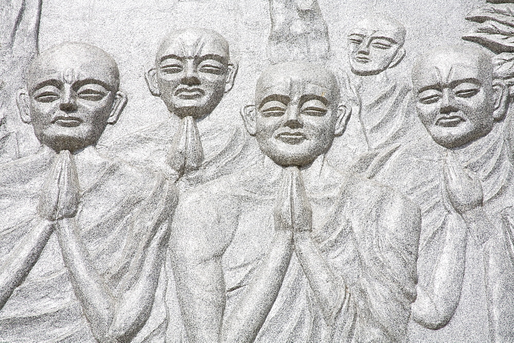 Long Son Pagoda, Nha Trang City, Vietnam, Asia; Relief Of Praying People