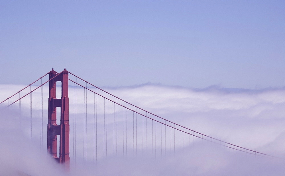 San Francisco, California; Golden Gate Bridge In Fog