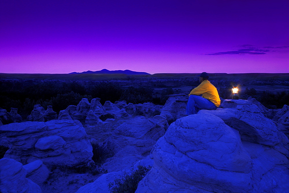 Hiker Watching The Sky In Twilight