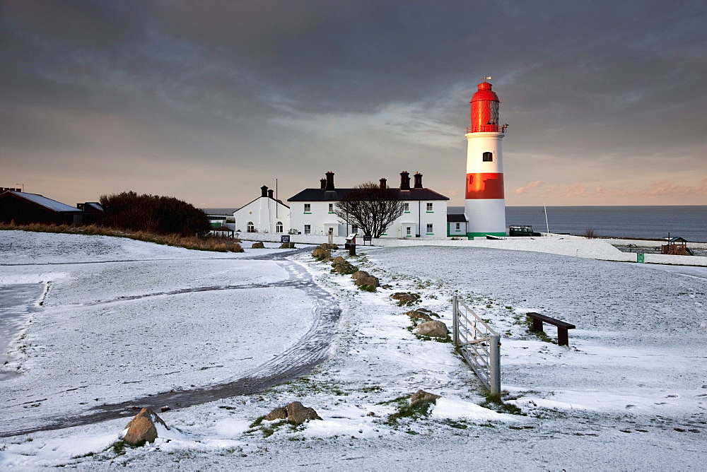 South Shields, Tyne And Wear, England; A Lighthouse And House Along The Coast