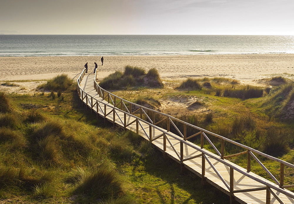 Tarifa, Costa De La Luz, Cadiz, Andalusia, Spain; A Wooden Boardwalk Leading To Dos Mares Beach In Front Of Hotel Dos Mares