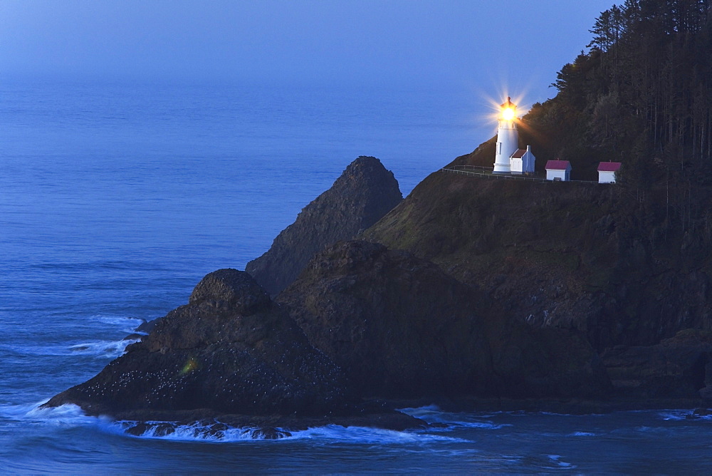 Oregon, United States Of America; Heceta Head Lighthouse At Sunset