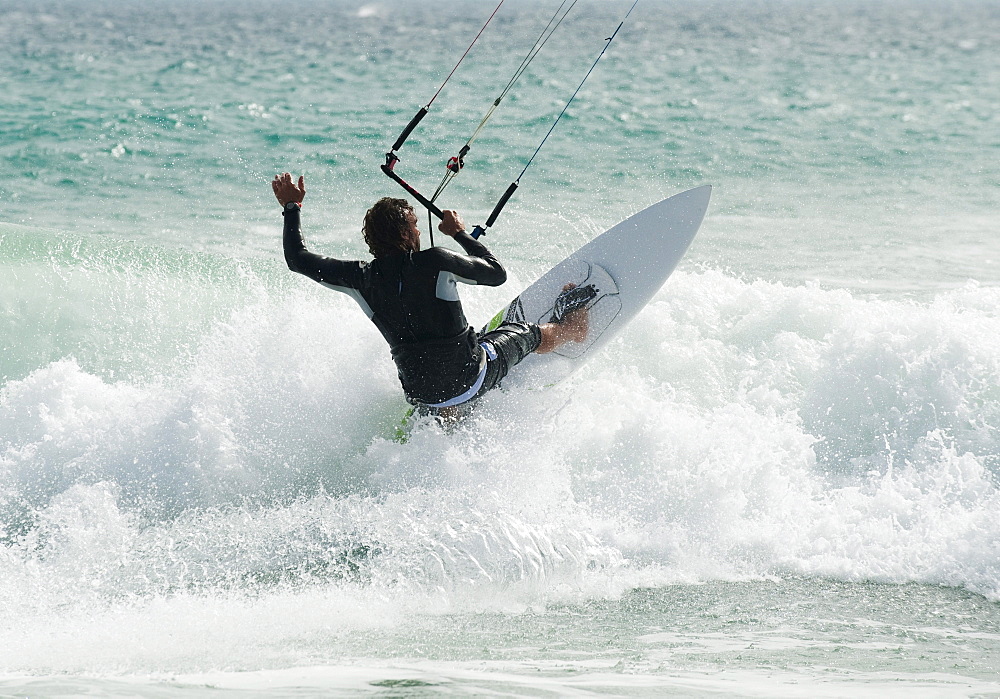 A Man Kitesurfing At Punta Paloma Beach; Tarifa, Cadiz, Andalusia, Spain