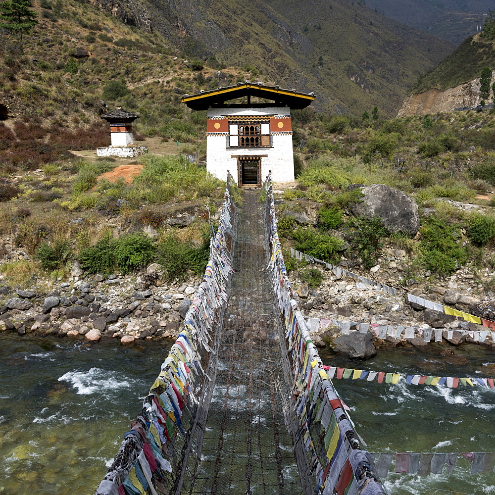 Suspension Bridge Made From Wood And Chain Across Paro River, Near Tachog Lhakhang Dzong, Paro, Bhutan