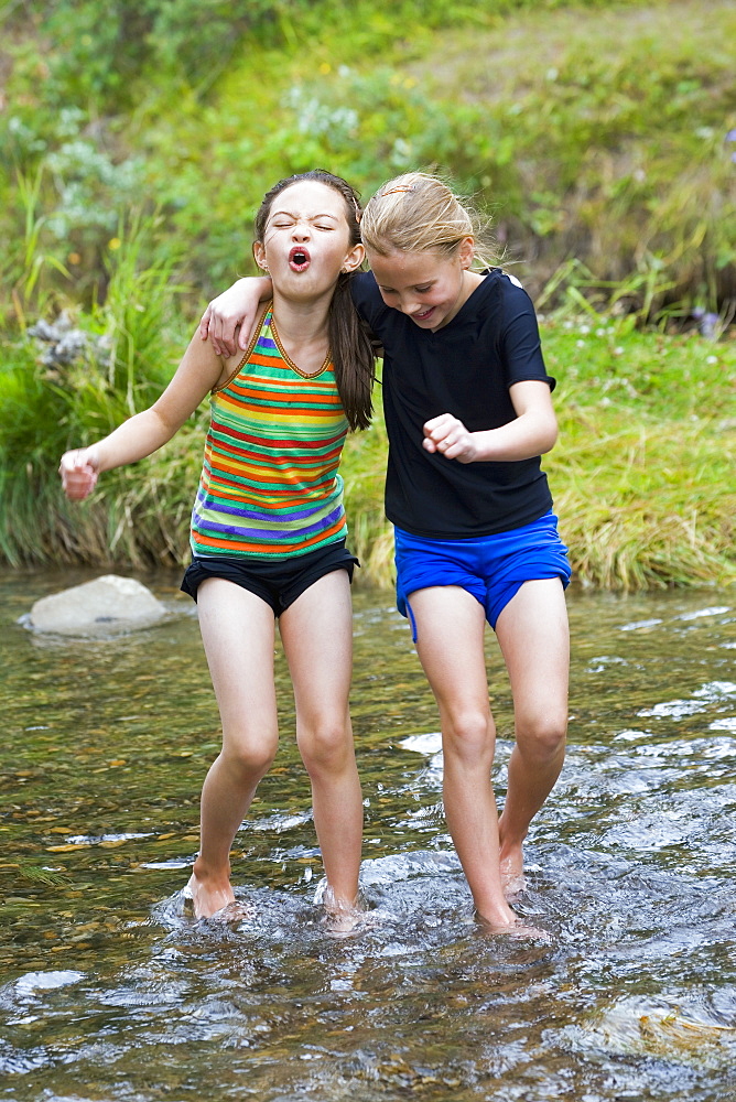 Girls Playing In Water