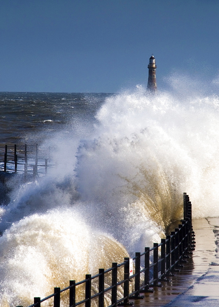 Waves Crashing By Lighthouse At Sunderland, Tyne And Wear, England, United Kingdom