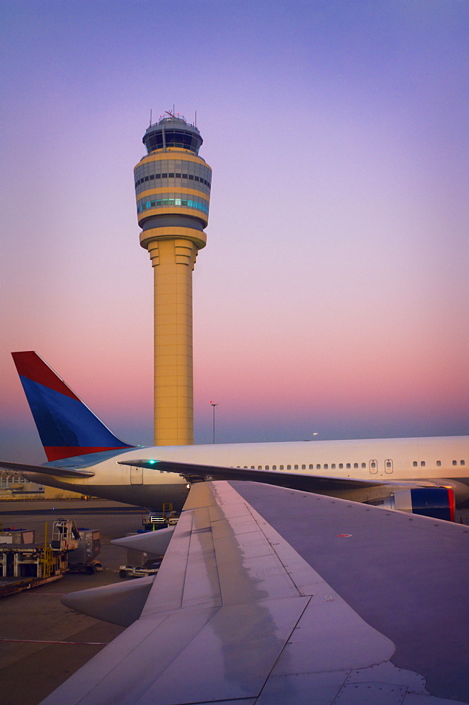 View Of Control Tower Out The Window Of A Commercial Airplane