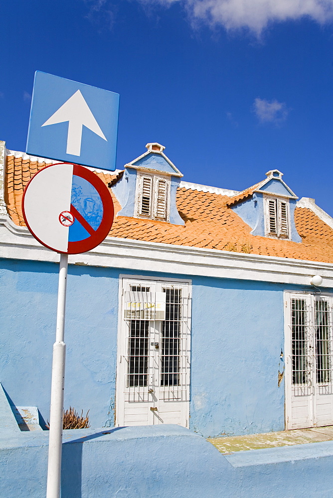 Blue Building With Sign Outside