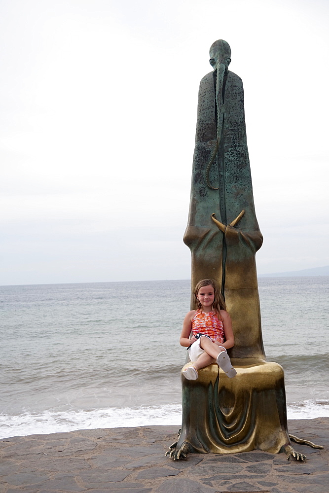 Girl Sitting By A Statue, Puerto Vallarta, Mexico