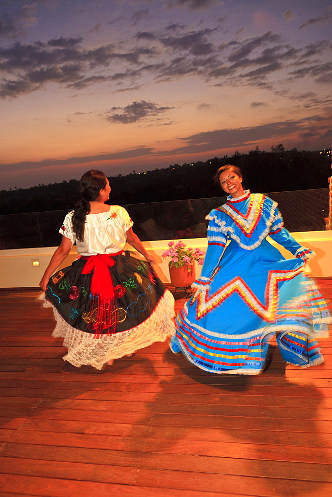 Hispanic Women Dancing In Traditional Folkloric Dresses Guaycura Boutique Hotel And Spa, Todos Santos, Baja California, Mexico