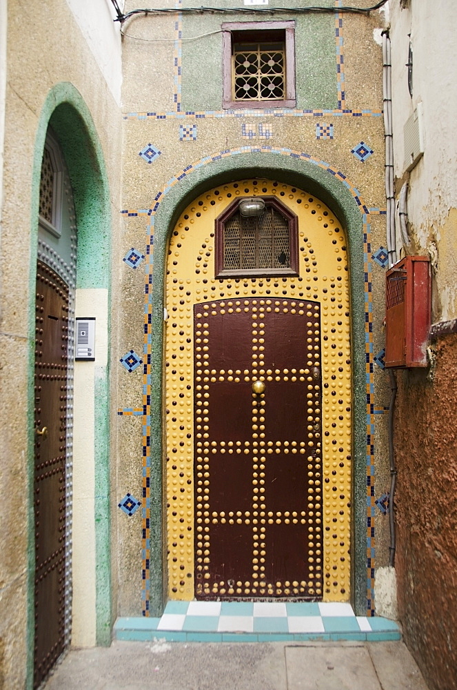 Uniquely decorated door with an arch and a design on the facade of the house, Casablanca morocco