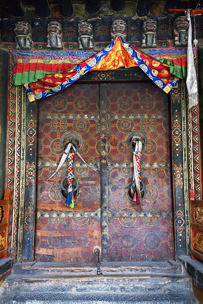 Ornate colourful doors at jokhang temple, Lhasa xizang china