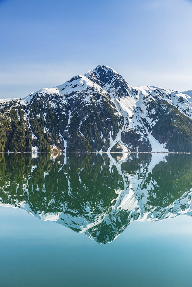 The Snow Covered Chugach Mountains Reflected In The Waters Of Barry Arm In Springtime, Chugach National Forest, Alaska, United States Of America