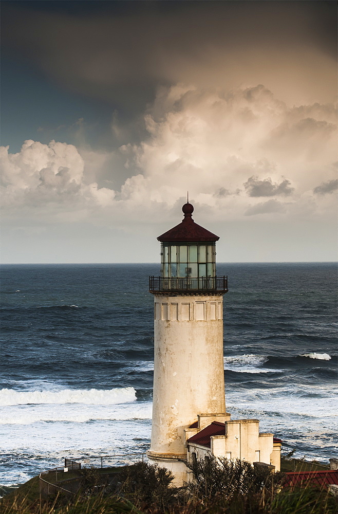 North Head Lighthouse Complemented By Clouds And Surf, Ilwaco, Washington, United States Of America