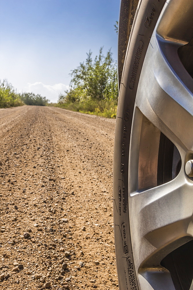 Close Up Of A Tire On A Dirt Road, Fort Mckay, Alberta, Canada