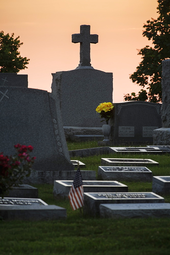 Tombstones In A Cemetery At Sunset, Ohio, United States Of America