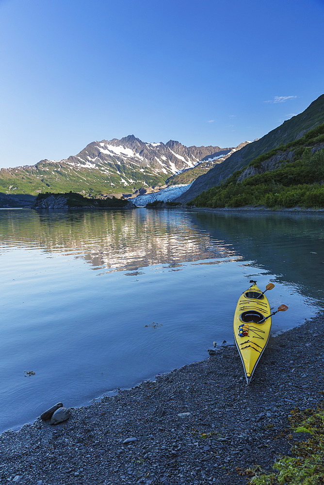 Kayak On The Beach With Shoup Glacier Spilling Over The Chugach Mountains Into Shoup Bay, Shoup Bay State Marine Park, Prince William Sound, Valdez, Alaska, United States Of America