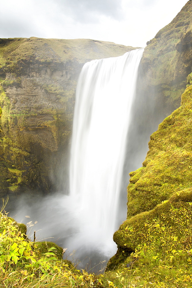 A Majestic Waterfall And Mist, Iceland