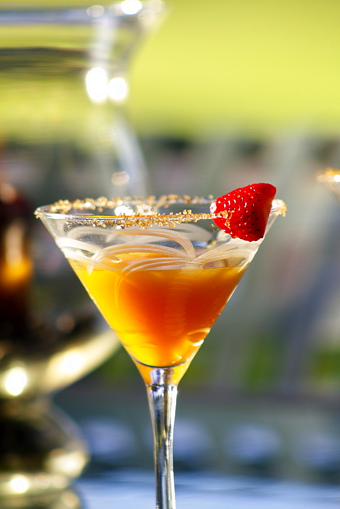 Hawaii, Maui, A Tropical Mango Martini With Strawberry Garnish.