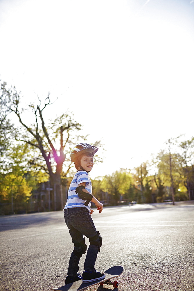 Young Boy Riding A Skateboard, Montreal, Quebec, Canada