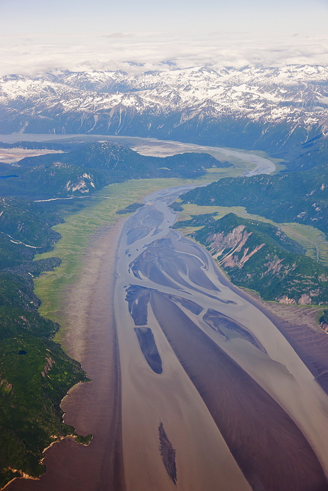 Aerial View Of Snow-Capped Peaks Surrounding A Green River Valley, Aleutian Range, Alaska Peninsula, Southwestern Alaska, USA, Summer